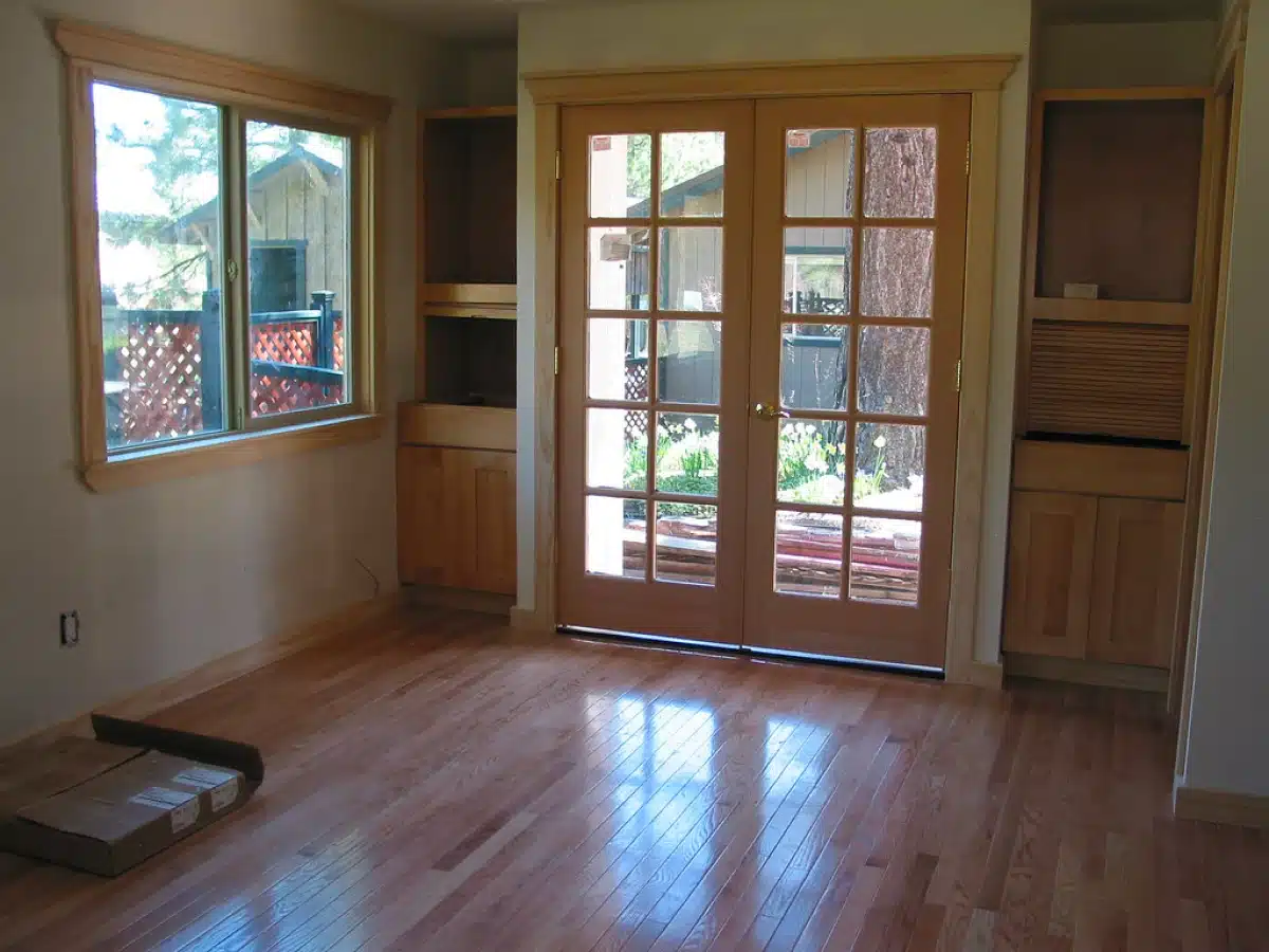 Empty room with wooden floors.