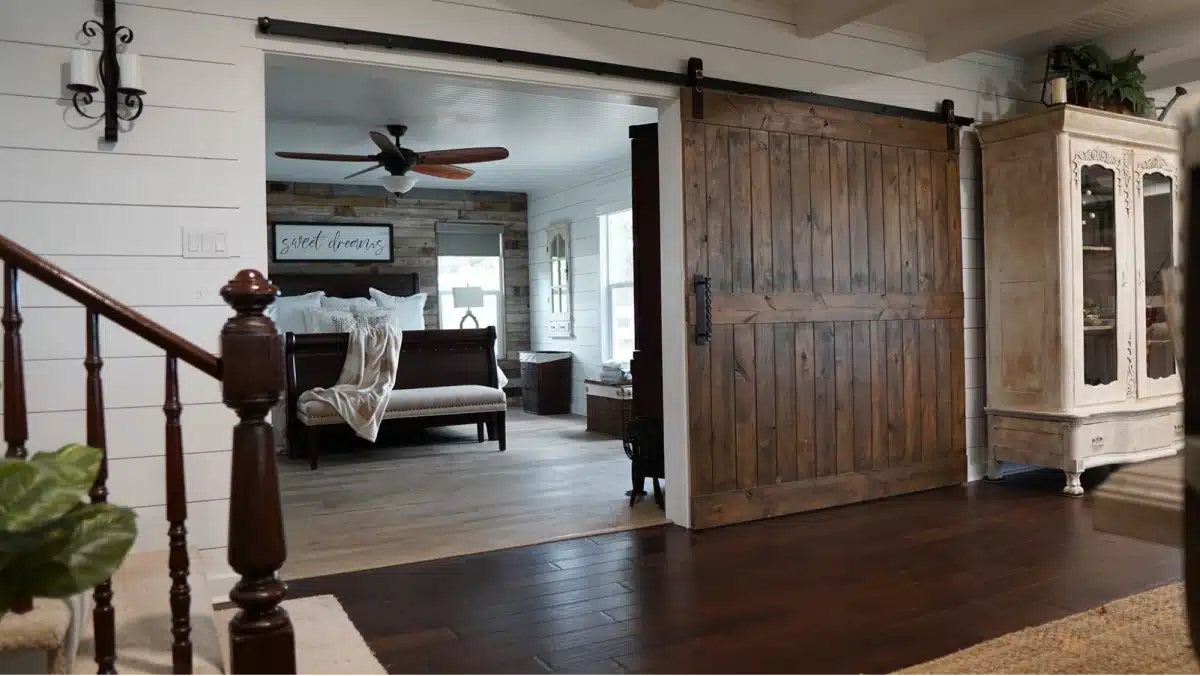 Rustic bedroom with sliding barn door